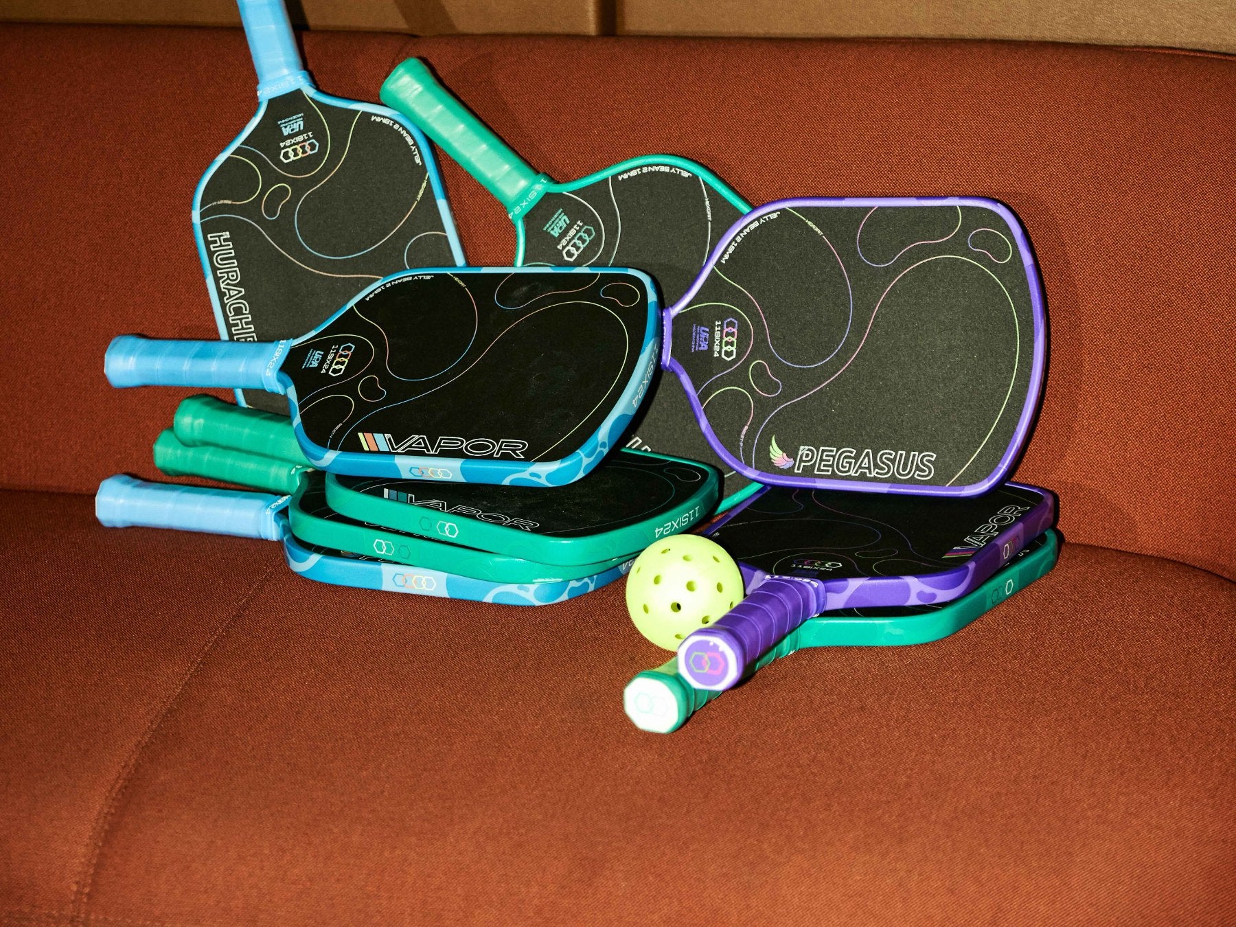 Jelly Bean 2 paddles with colorful grips and iridescent graphics