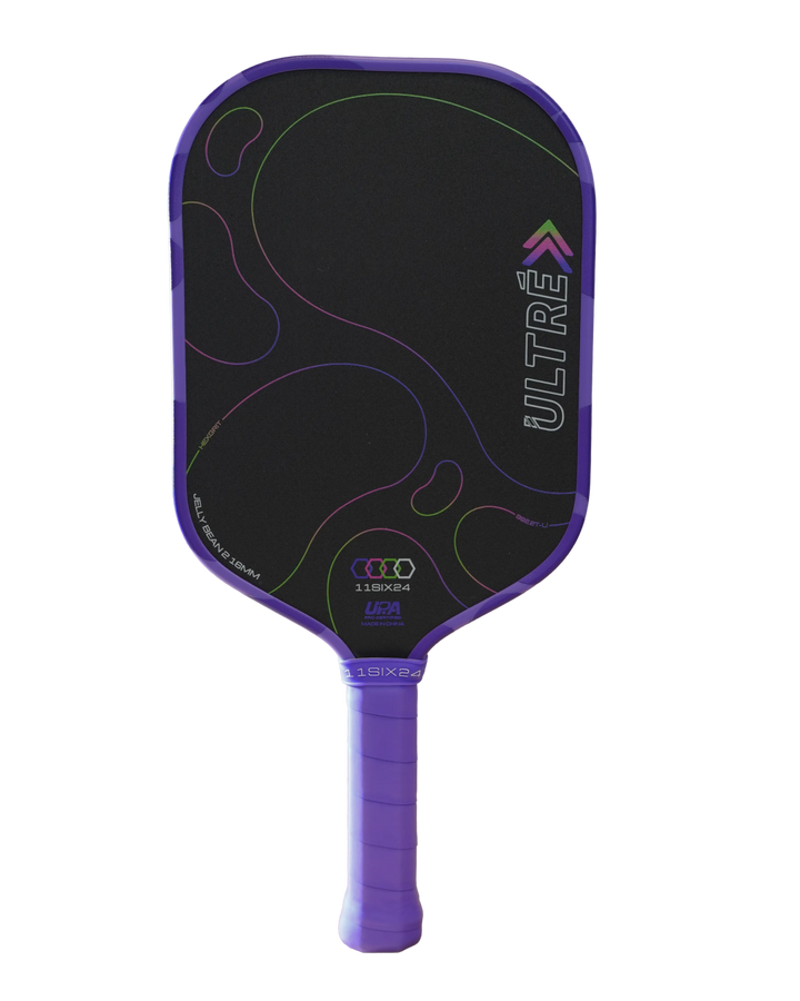 A purple and black pickleball paddle on a solid white background, featuring the ULTRE brand name and a textured purple handle. Jelly Bean 2 paddle