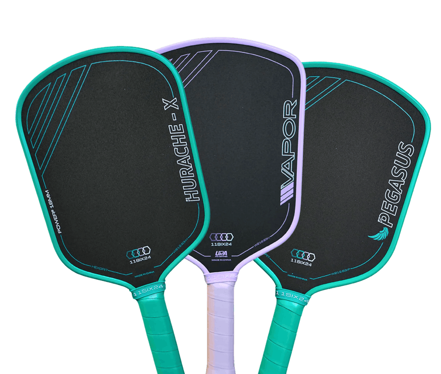 Three pickleball paddles with 'Hurache X', 'Vapor', and 'Pegasus' branding on a black background.